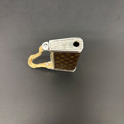 LOT 36: Vintage and Contemporary Lighters with Keychains & More