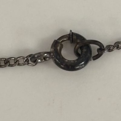 LOT 66: Sterling Miraculous Medal on Mother of Pearl Heart Pendant 7.6gtw (Silver-Tone Chain) with Sterling and Marcasite Miraculous...