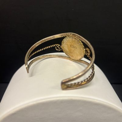 LOT 75: Alpaca Mexico Silver Inlaid Floral Cuff Bracelet, Coin Bracelet along with Dream Catcher Silvertone Earrings