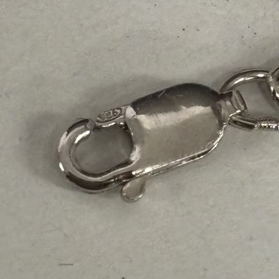 LOT 82: Natural Stone and 925 Silver Pendant 15.1gtw on a 925 Silver Chain 14.2g