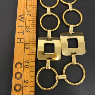 LOT 41: Vintage Belts, Red Enamel Costume Jewelry, Cat-Themed Ashtray and Pin & More