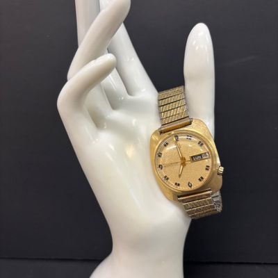 LOT 103: Bulova Accutron 14k Gold Case Watch F49271