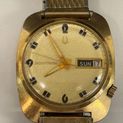 LOT 103: Bulova Accutron 14k Gold Case Watch F49271