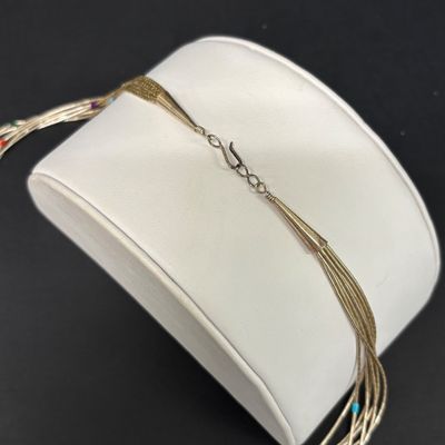 LOT 83: Multi-Strand Liquid Silver Beaded Necklace Featuring a Natural Gemstone Inlay Pendant 27.2gtw