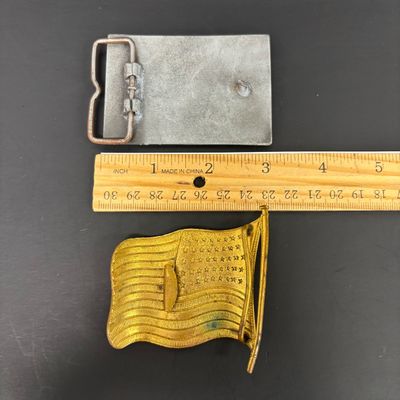 LOT 37: Tony Laina Leather Belt Buckle, USA-Themed Pins, US Mint Independence Hall Coins & More