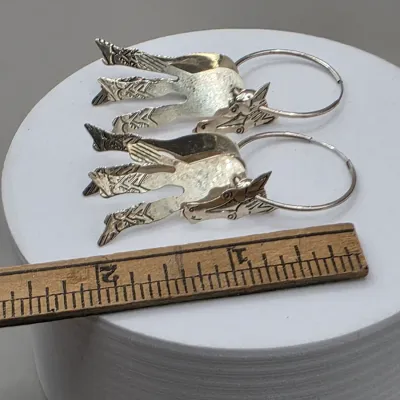 LOT 55: Two Pairs of Vintage Sterling Silver Earrings (13.6gtw) and an Aztec Panel Bracelet with Inlaid Abalone