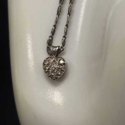 LOT 92: Vintage 14k Gold and Diamond Chip Pendant on a 925 Sterling Chain 4.3gtw
