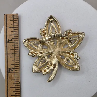 LOT 63: Vintage Gold Tone Brooches