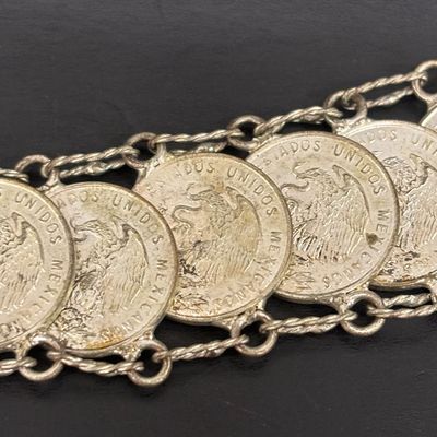 LOT 75: Alpaca Mexico Silver Inlaid Floral Cuff Bracelet, Coin Bracelet along with Dream Catcher Silvertone Earrings