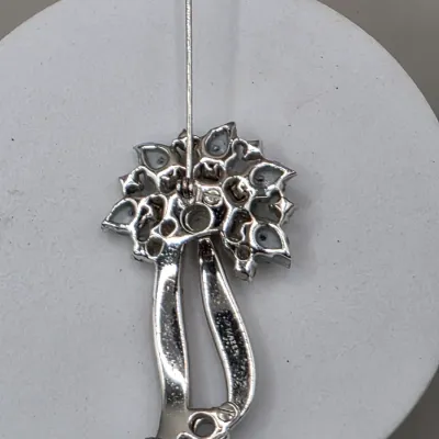 LOT 58: Collection of 5 Vintage Silvertone Brooches Mazer & More