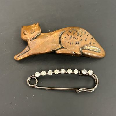 LOT 41: Vintage Belts, Red Enamel Costume Jewelry, Cat-Themed Ashtray and Pin & More