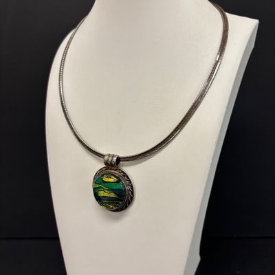 LOT 84: Sterling 925 and Dichroic Glass Pendant 20.9gtw with a Sterling 925 Italy Chain 21.6g