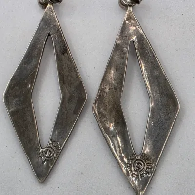 LOT 55: Two Pairs of Vintage Sterling Silver Earrings (13.6gtw) and an Aztec Panel Bracelet with Inlaid Abalone