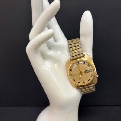 LOT 103: Bulova Accutron 14k Gold Case Watch F49271