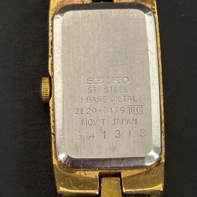 LOT 76: Collection of 3 Gold Tone Watches: Texas Instruments, Benrus & Seiko