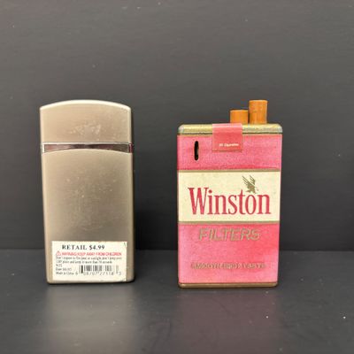 LOT 36: Vintage and Contemporary Lighters with Keychains & More