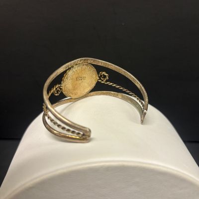 LOT 75: Alpaca Mexico Silver Inlaid Floral Cuff Bracelet, Coin Bracelet along with Dream Catcher Silvertone Earrings