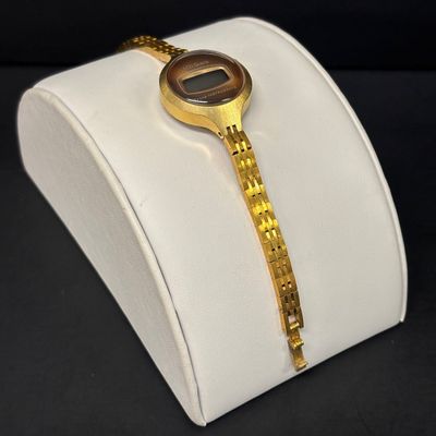 LOT 76: Collection of 3 Gold Tone Watches: Texas Instruments, Benrus & Seiko