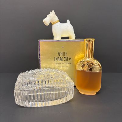 LOT 28: New/Old Stock White Diamonds 5.3Oz Body Powder, Calais Cologne Spray, Milk Glass Scotty Dog Perfume Bottle & Crystal Dish