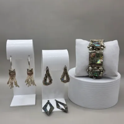 LOT 55: Two Pairs of Vintage Sterling Silver Earrings (13.6gtw) and an Aztec Panel Bracelet with Inlaid Abalone