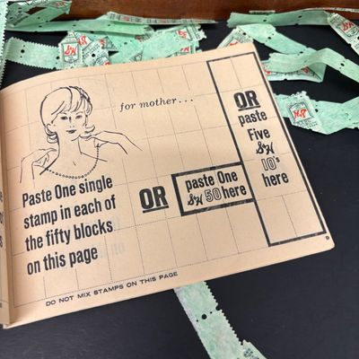 LOT 42: Vintage Quick Saver Books of Green Stamps, Photomatic Photo Booth Photos, Small Pink Plastic Bobble Head Elephant & More