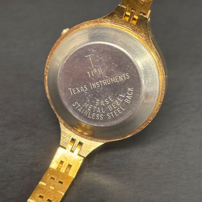 LOT 76: Collection of 3 Gold Tone Watches: Texas Instruments, Benrus & Seiko