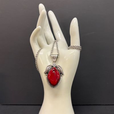 LOT 82: Natural Stone and 925 Silver Pendant 15.1gtw on a 925 Silver Chain 14.2g