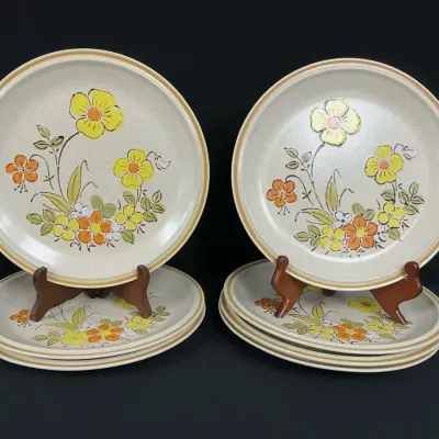 Seven Vintage Stoneware Dinner Plates 