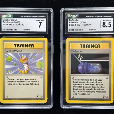 2 2000 Base Set Pokémon Cards Gust of Wind & Defender CGC Graded 