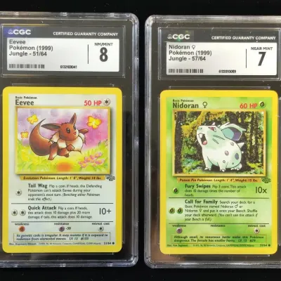 2 1999 Pokemon Jungle Cards Eevee & Nidoran CGC Graded