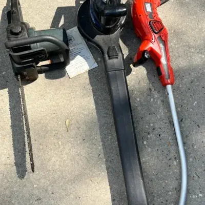 Electric Leaf blower, Chainsaw, And Grass Hog