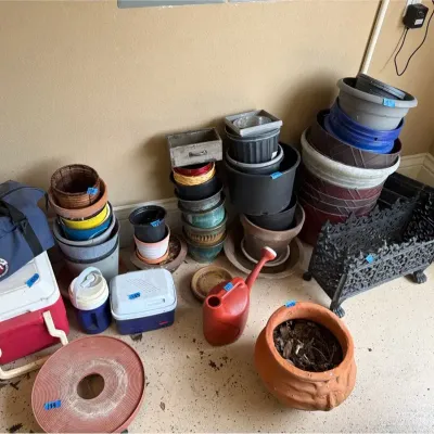 Cast Iron, Clay Pottery, Plastic And Ceramic Pots, Coleman Cooler, And Other Items