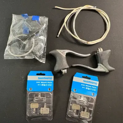 Bicycle Brake Parts Lot – 2 Shimano B01S Disc Brake Pads, 2 Brake Levers & Cables