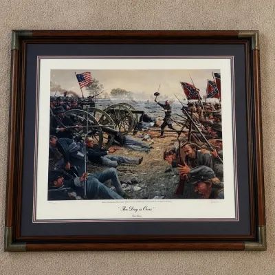 Sale Photo Thumbnail #46: Limited-edition lithograph by Civil War artist Dale Gallon, titled “The Day is Ours.” The scene depicts Brigadier General Lewis Armistead leading Pickett’s Charge at Gettysburg on July 3, 1863, approaching the Union line at the Angle during one of t
