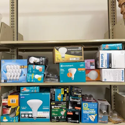 Sale Photo Thumbnail #200: This collection features a variety of light bulbs including LED, halogen, and floodlight types from well-known brands such as Philips and Ecosmart. The bulbs come in different sizes and wattages, suitable for multiple lighting fixtures and needs. The asso
