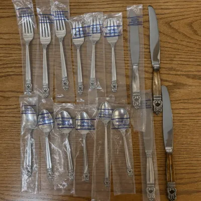 Sale Photo Thumbnail #15: 16-piece grouping of International Silver Co. Royal Danish sterling silver flatware, a classic Scandinavian-inspired pattern introduced in 1939. Pieces feature the distinctive openwork scroll/acorn-style terminal and are marked “U.S.A. / ROYAL DANISH / 