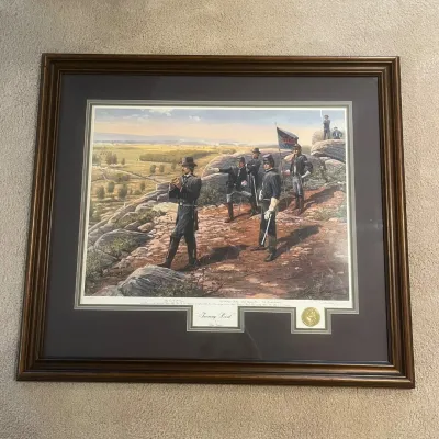 Sale Photo Thumbnail #47: Framed “Turning Point” by noted historical artist Dale Gallon, depicting Brigadier General G.K. Warren and his staff on Little Round Top during the Battle of Gettysburg, observing the battlefield below. Gallon is particularly well known for his detail