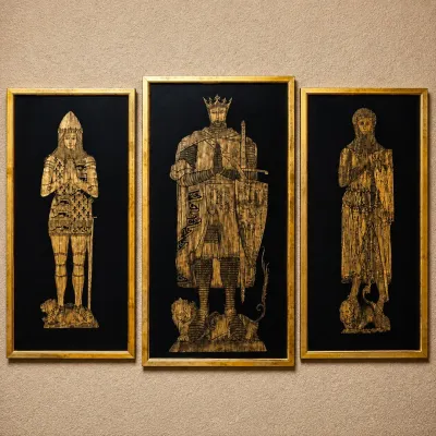 Sale Photo Thumbnail #3: Coordinated set of three vintage English monumental brass rubbings depicting medieval knights and nobility in elaborate armor and heraldic dress. According to the owner, the pieces are English in origin.

Executed in metallic gold/brass tones against dark