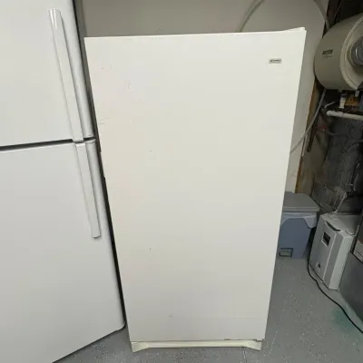 Sale Photo Thumbnail #189: This Kenmore commercial freezer, model 253.22411102, offers a generous storage capacity with dimensions of 60 inches tall, 28 inches wide, and 28.5 inches deep. Featuring a clean white finish, this upright freezer is designed for efficient organization wi