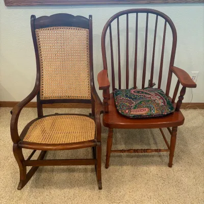 Sale Photo Thumbnail #194: This set features two charming vintage chairs. A rocking chair crafted from rich wood with elegantly curved armrests showcasing intricate woven cane seating and backrest, providing both comfort and classic style. The second with elegant armrests for dinin