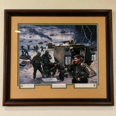 Sale Photo Thumbnail #37: Framed limited-edition military print titled “Tawakalna Sunset” by noted American military artist Don Stivers (1926–2009). The dramatic work depicts the 2nd Armored Cavalry Regiment during Operation Desert Storm, specifically the fighting involving 