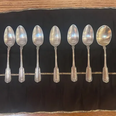 Sale Photo Thumbnail #16: Group of 7 antique Gorham sterling silver spoons, including 6 smaller spoons and 1 larger soup spoon. Each features an ornate paneled handle with decorative border detailing. Pieces are marked STERLING with Gorham hallmarks and additionally stamped “GUS