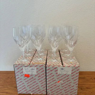 Sale Photo Thumbnail #145: This elegant set of 12 iced tea glasses from  Nachtmann Bleikristall Turning Point collection features beautifully crafted crystal with a unique cut design that enhances its brilliance. Each glass stands 8 inches tall, perfect for serving iced tea or othe