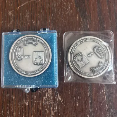 Sale Photo Thumbnail #64: Pair of U.S. Army 23rd Engineer Battalion / 23rd Armored Engineers challenge coins associated with the 3rd Armored Division “Spearhead.”

The coins feature unit insignia and the transition from the 23rd Armored Engineers to the 23rd Engineer Battalion