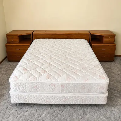 Sale Photo Thumbnail #171: This queen size bed comes complete with a comfortable mattress and a distinctive headboard designed in three separate wooden pieces. The headboard features integrated storage compartments, including drawers and a top lift-up section, providing practical a