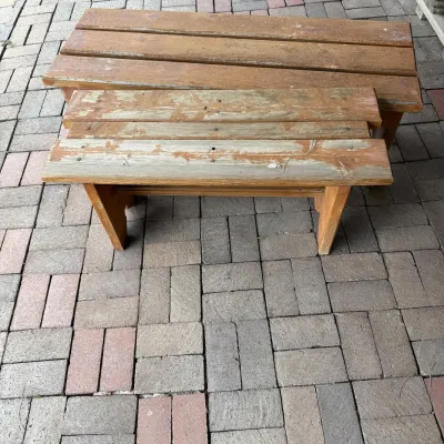 Sale Photo Thumbnail #214: This set includes two rustic outdoor benches made from sturdy wood, featuring a weathered finish that enhances their natural charm. Bench 1 measures approximately 36 inches wide by 18 in high by 13.5 in deep. Bench 2 is 47 inches wide, 17 in high inches d
