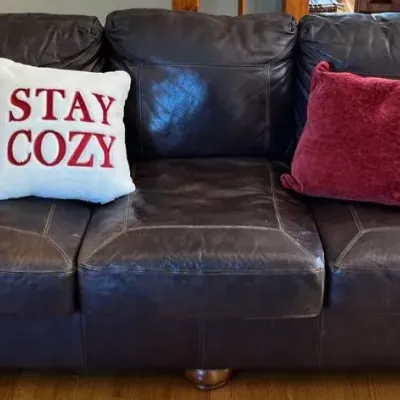 Ashley Furniture Leather Sofa w/ Throw Pillows