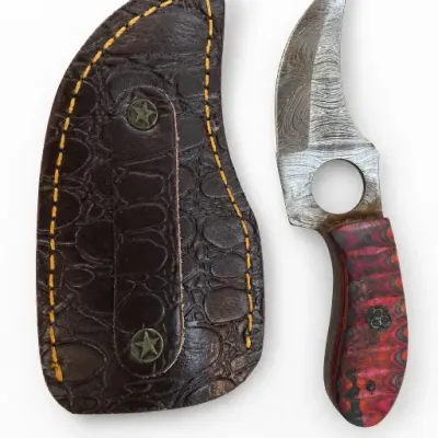 Fixed-Blade Knife With Red Handle and Tooled Leather Sheath