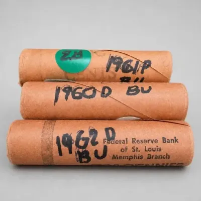 Three Bank-Wrapped Rolls of Pennies