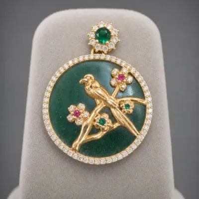 Gold-Tone Bird and Flower Pendant With Green and Pink Stones
